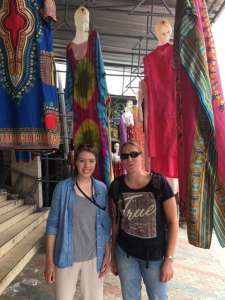 travel nurses at a fabric market in Cotonou Benin Africa