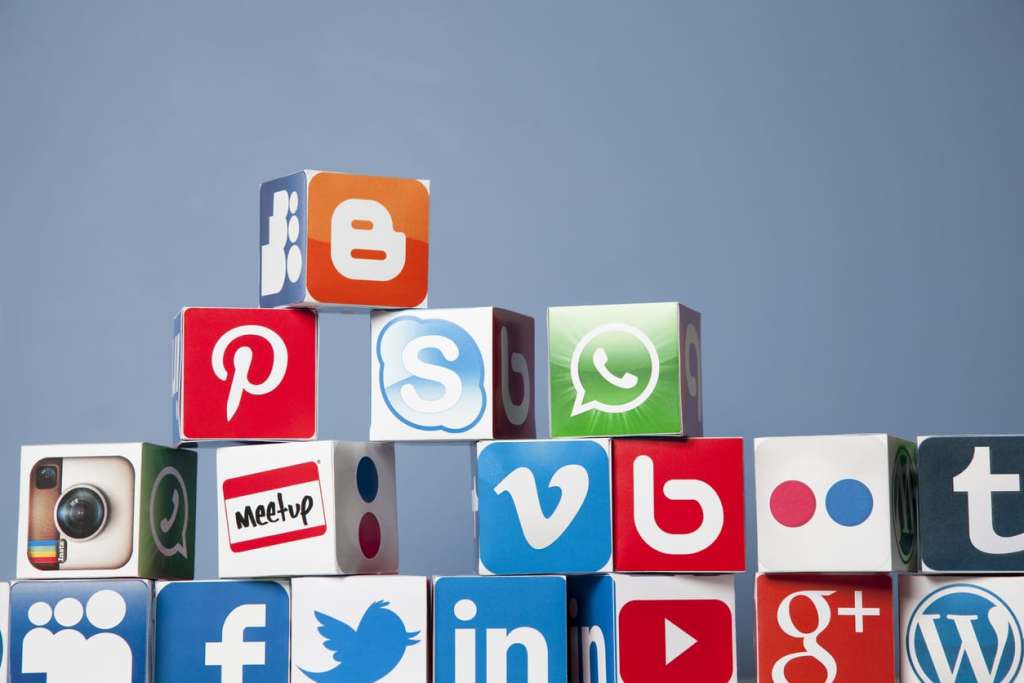 London, United KIngdom- September 24, 2013: Social media logos printed onto handmade cubes. Logos include Facebook, You tube, twitter, pinterest, linkedin and google plus. Social media uses web and mobile technology to connect people