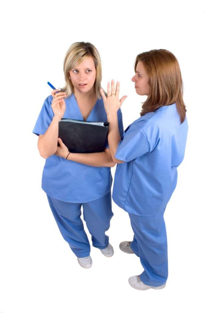 Two Nurses Talking About A Doctor