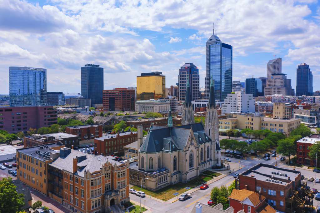 Top Indiana Spots for Your Next Travel Assignment Indianapolis downtown skyline at sunset with city buildings and skyline view