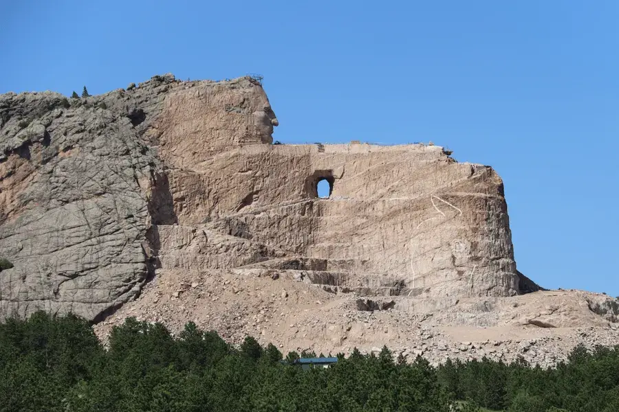 Top Bucket List Things To Do During Your South Dakota Assignment side view of Native American sculpture in mountain