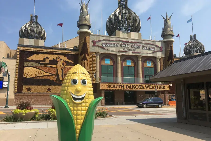 Top Bucket List Things To Do During Your South Dakota Assignment image of a corn statue outside of a palace in South Dakota